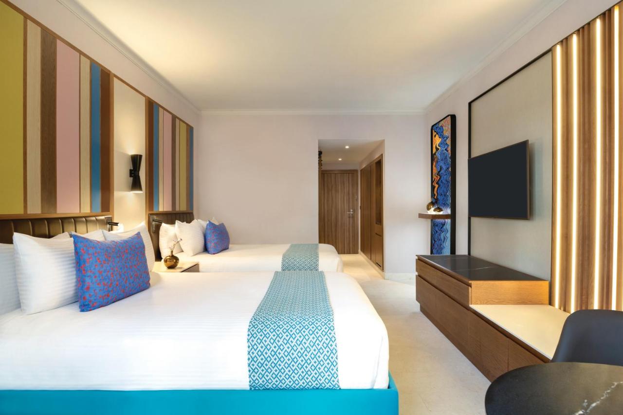 Deluxe Garden View Two Queens at Hilton La Romana, an All-Inclusive Family Resort