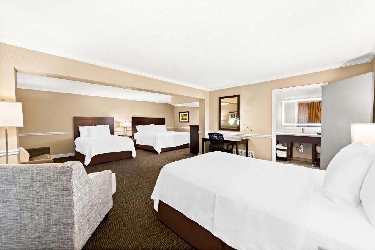 Family Suite with Pool View at Best Western State Fair Inn