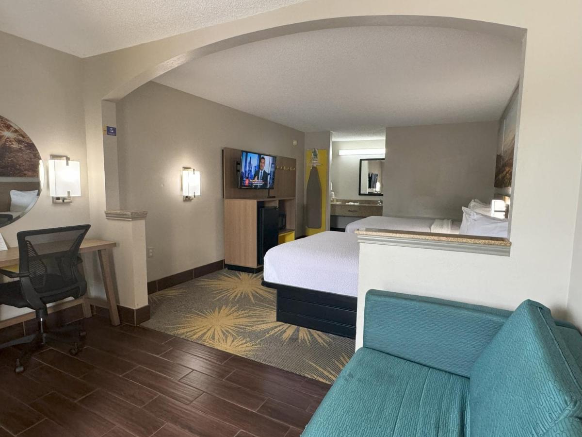 Queen Room with Two Queen Beds - Non-Smoking at Days Inn & Suites by Wyndham Tuscaloosa - Univ. of Alabama