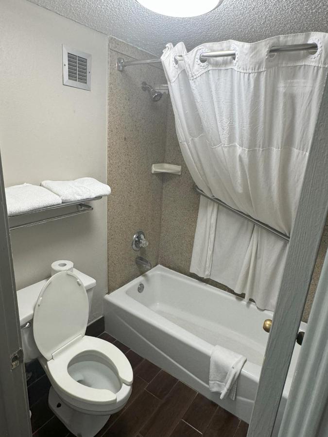 Queen Room with Two Queen Beds - Non-Smoking at Days Inn & Suites by Wyndham Tuscaloosa - Univ. of Alabama