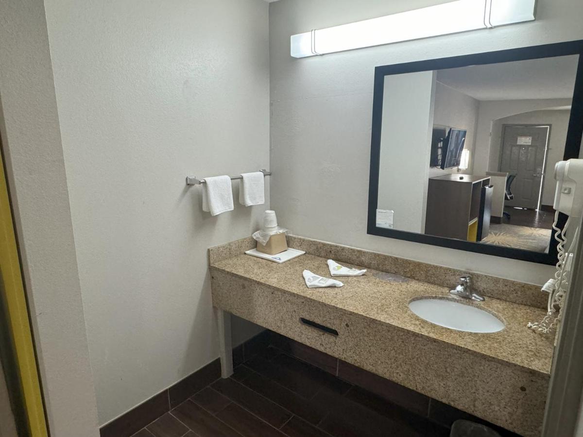 Queen Room with Two Queen Beds - Non-Smoking at Days Inn & Suites by Wyndham Tuscaloosa - Univ. of Alabama