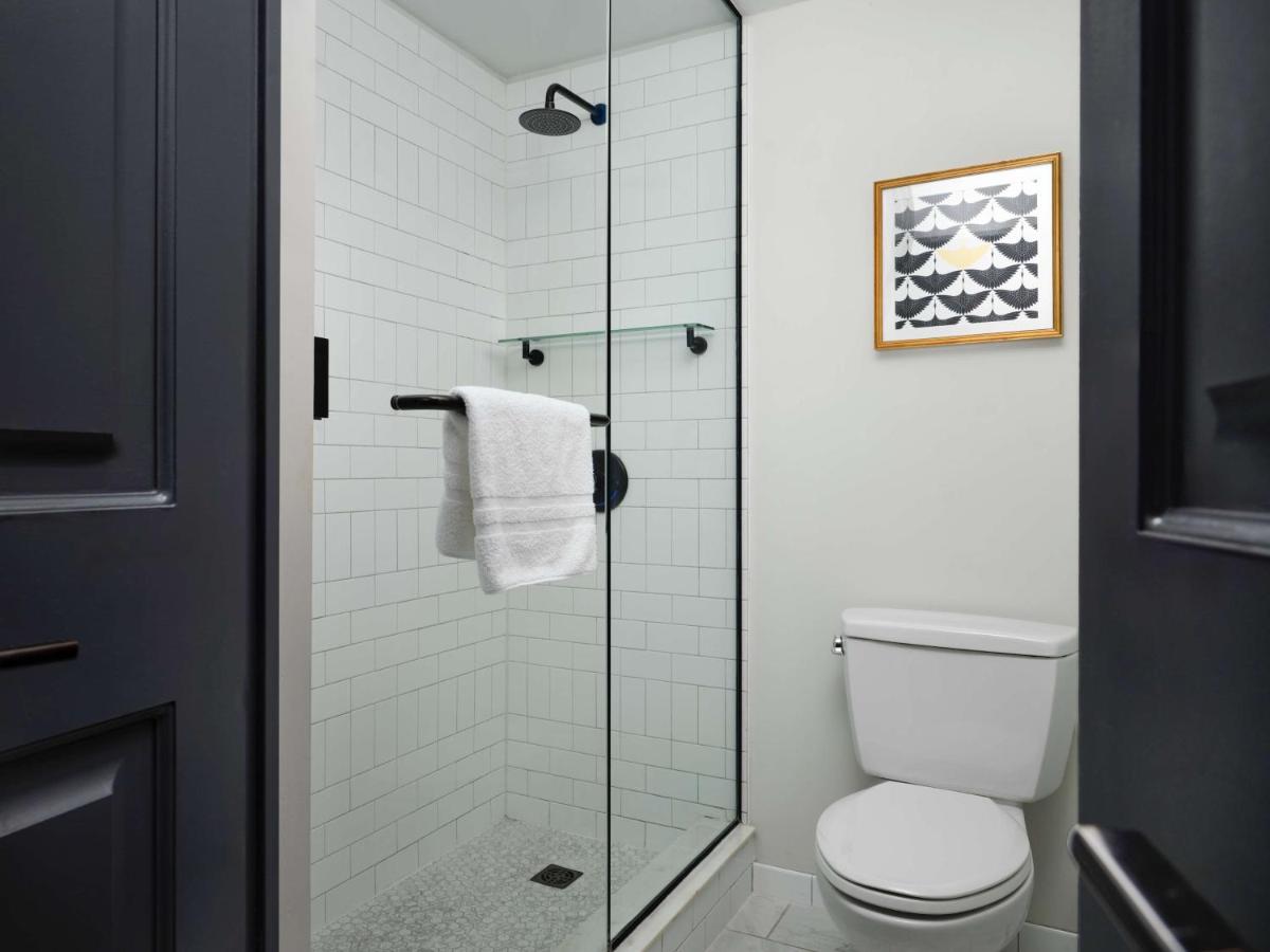 Small Queen Room at Hotel Phillips Kansas City Curio Collection by Hilton