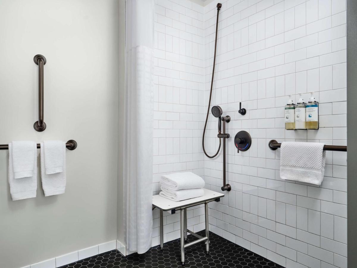 Deluxe King Room with Roll-In Shower - Mobility Accessible at Hotel Phillips Kansas City Curio Collection by Hilton