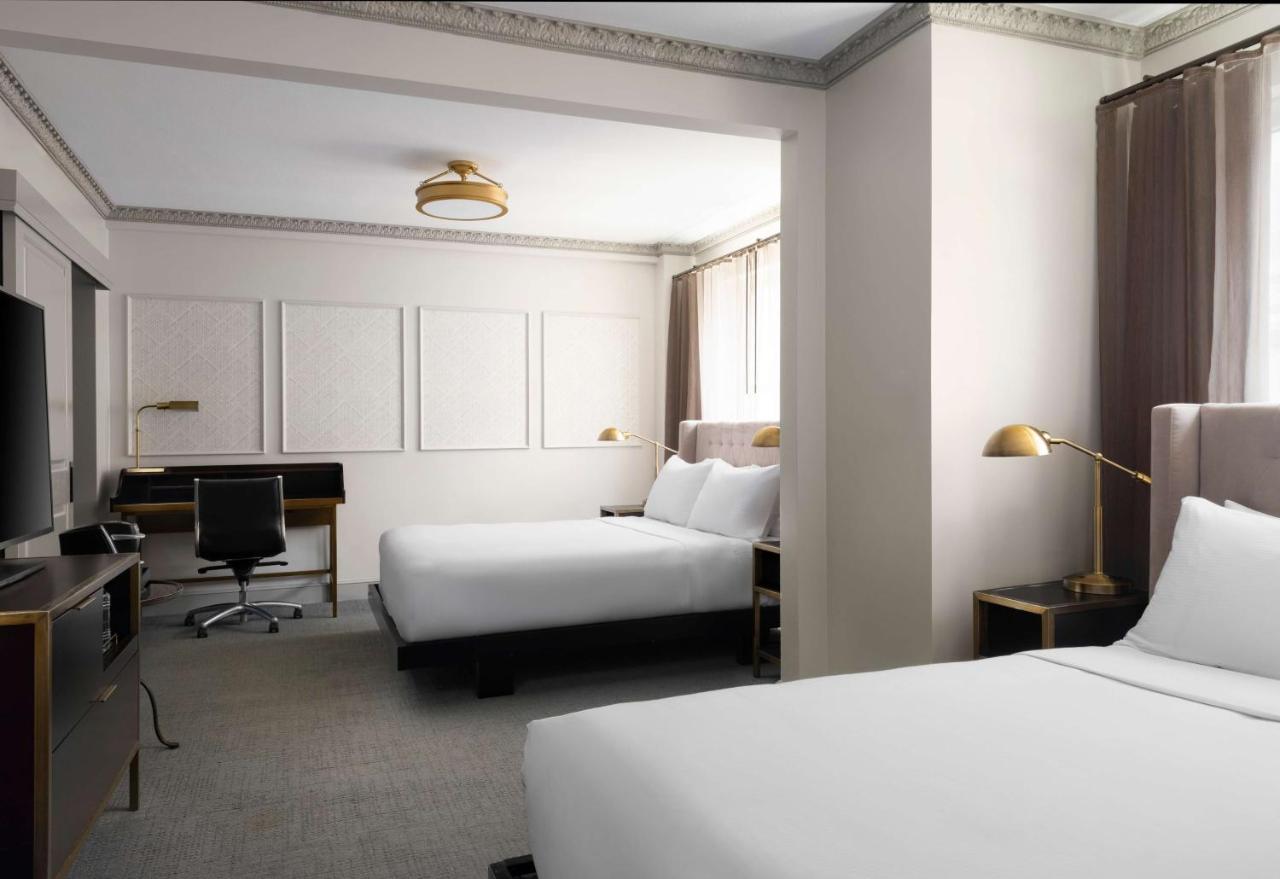 Queen Room with Two Queen Beds at Hotel Phillips Kansas City Curio Collection by Hilton