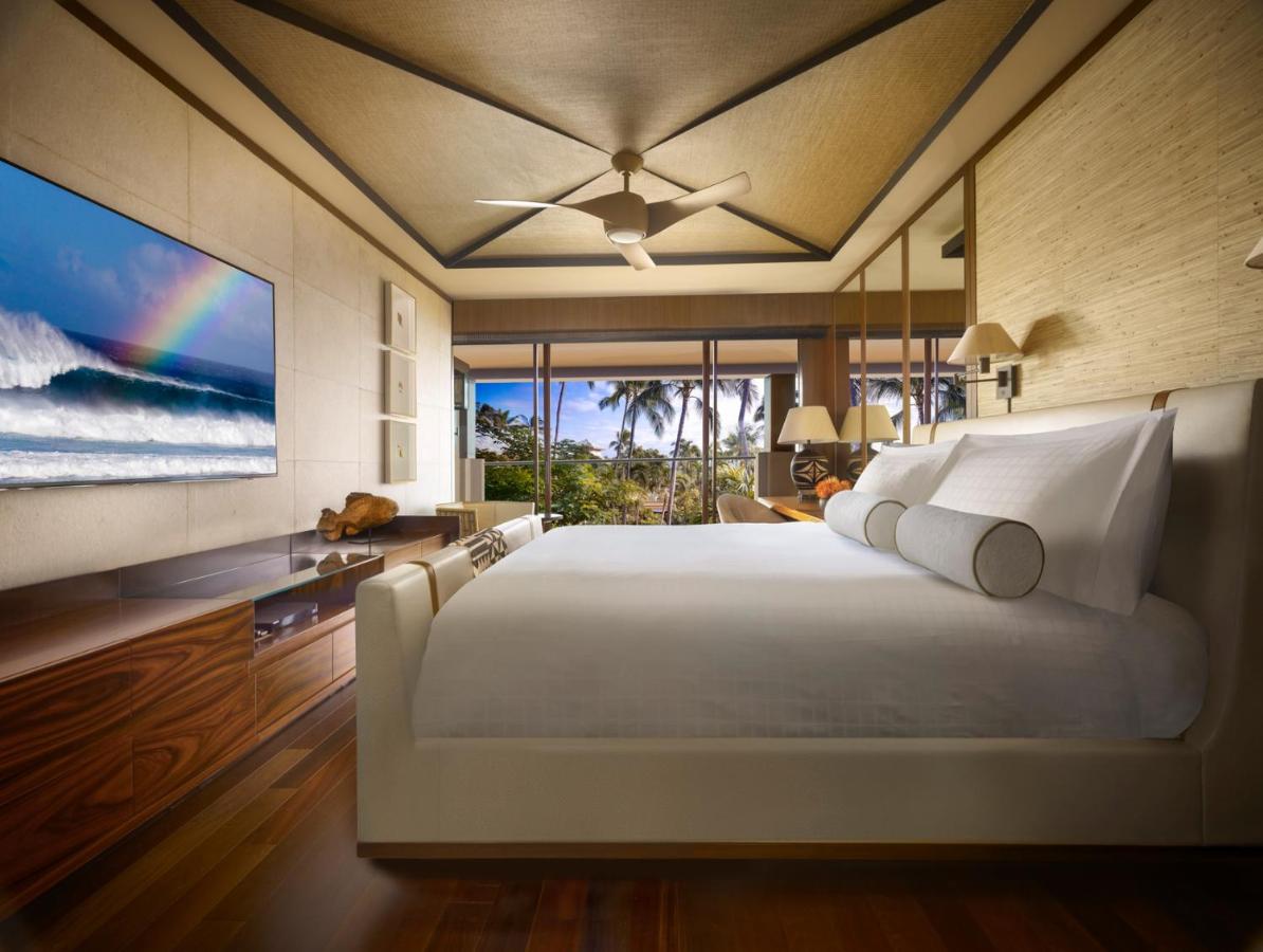 Ohana Partial Ocean View Suite king bed at Four Seasons Resort Lanai