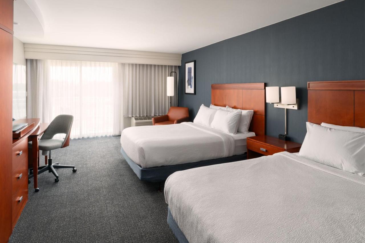 Queen Room with Two Queen Beds and Balcony at Courtyard Jacksonville Orange Park
