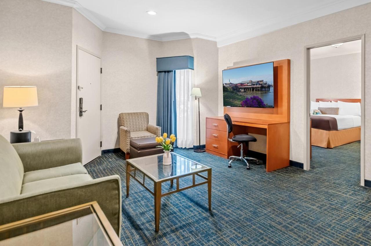 Suite Room with Three Queen Beds at Best Western De Anza Inn