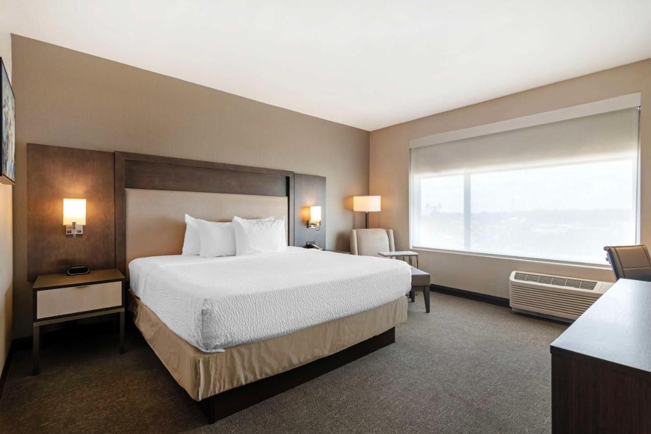 King Suite with Balcony at Best Western Plus Executive Residency Rigby's Water World Hotel