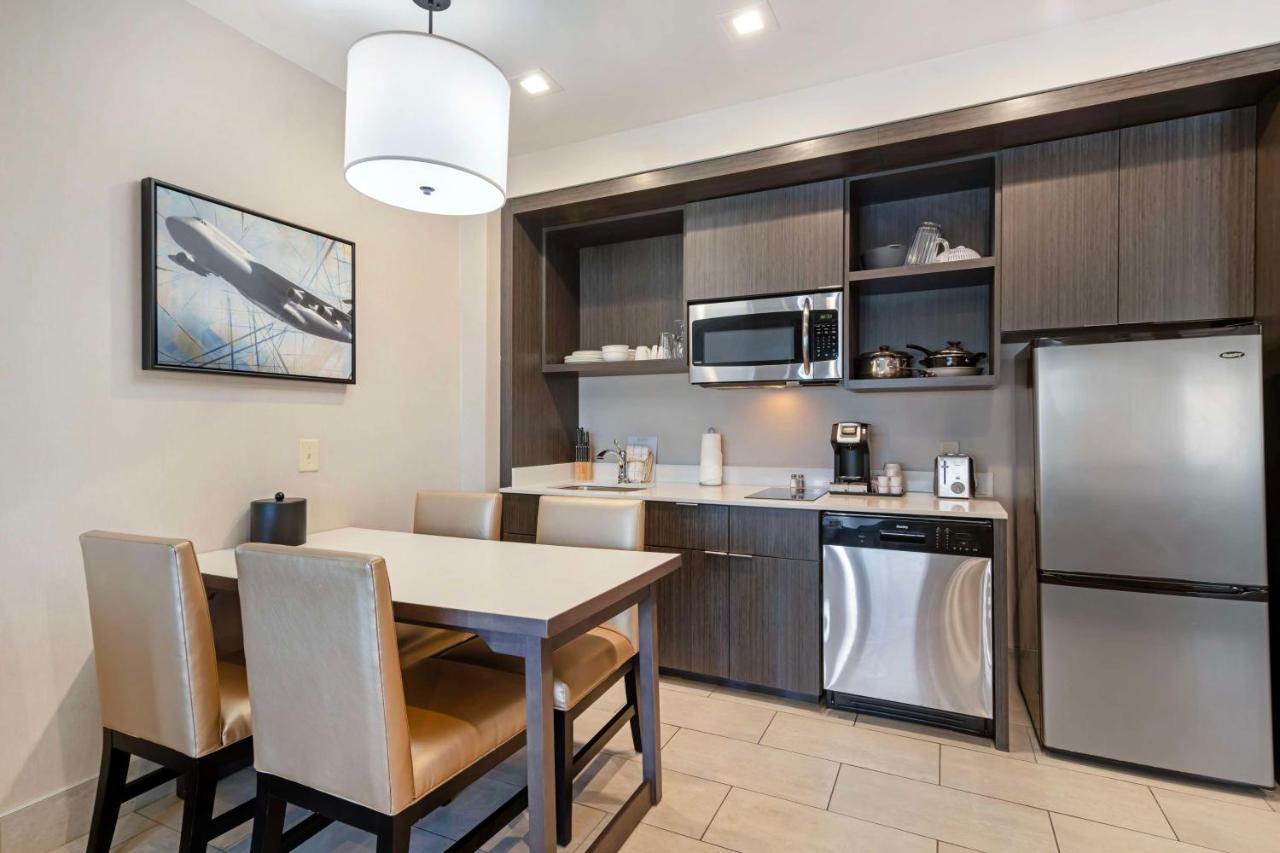 King Suite with Balcony at Best Western Plus Executive Residency Rigby's Water World Hotel
