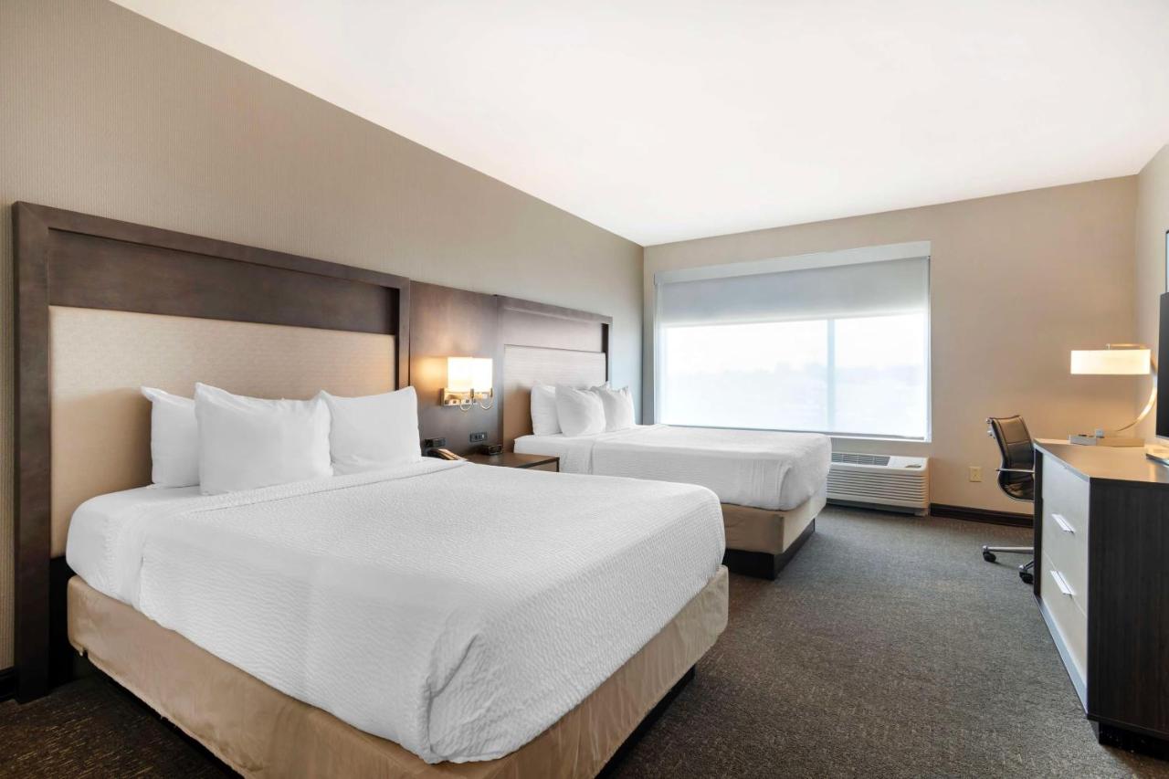 Queen Suite with Two Queen Beds at Best Western Plus Executive Residency Rigby's Water World Hotel