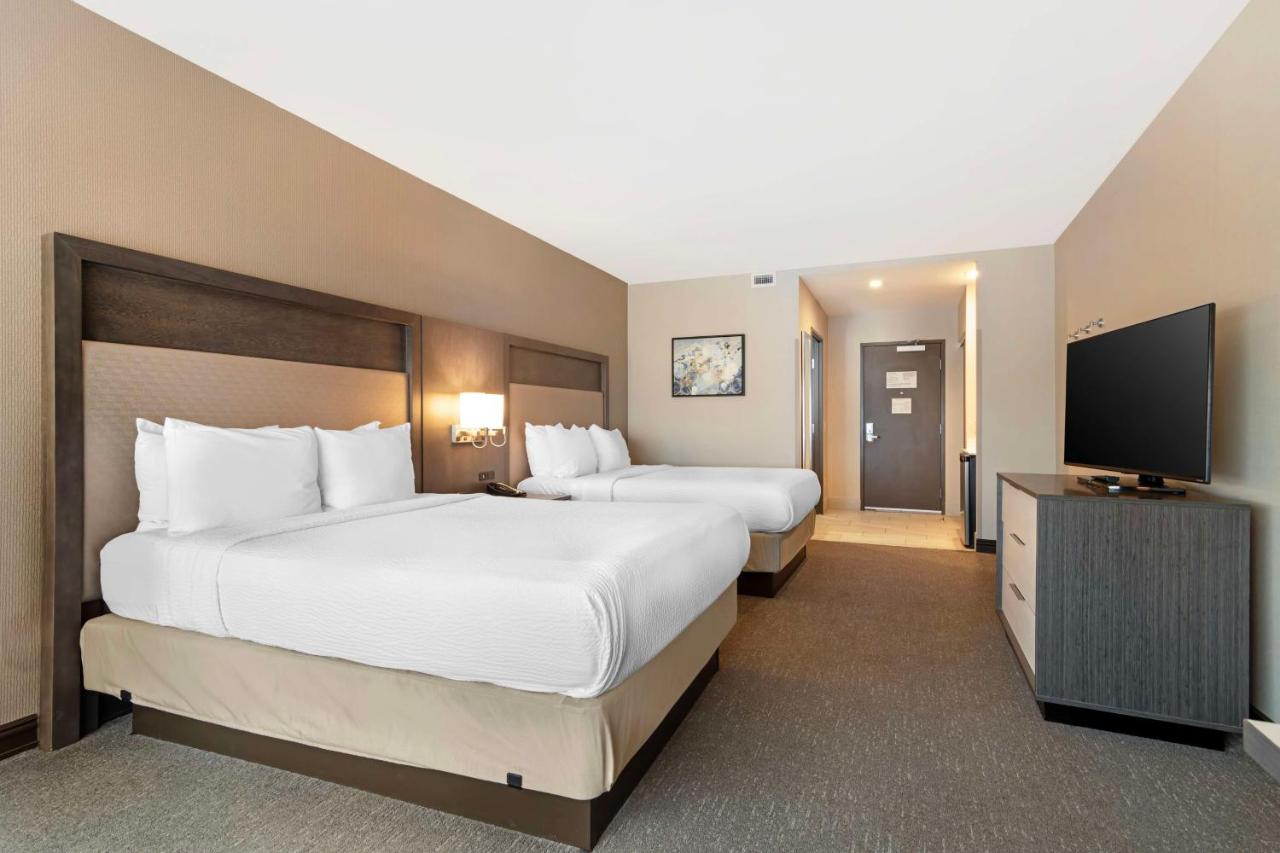Queen Room with Two Queen Beds at Best Western Plus Executive Residency Rigby's Water World Hotel