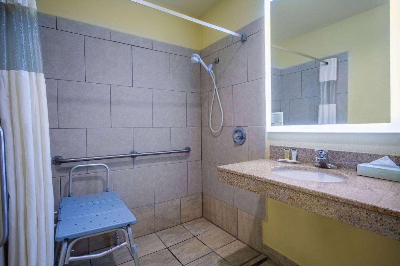 King Room with Roll-In Shower - Disability Access at Days Inn & Suites by Wyndham Waterloo