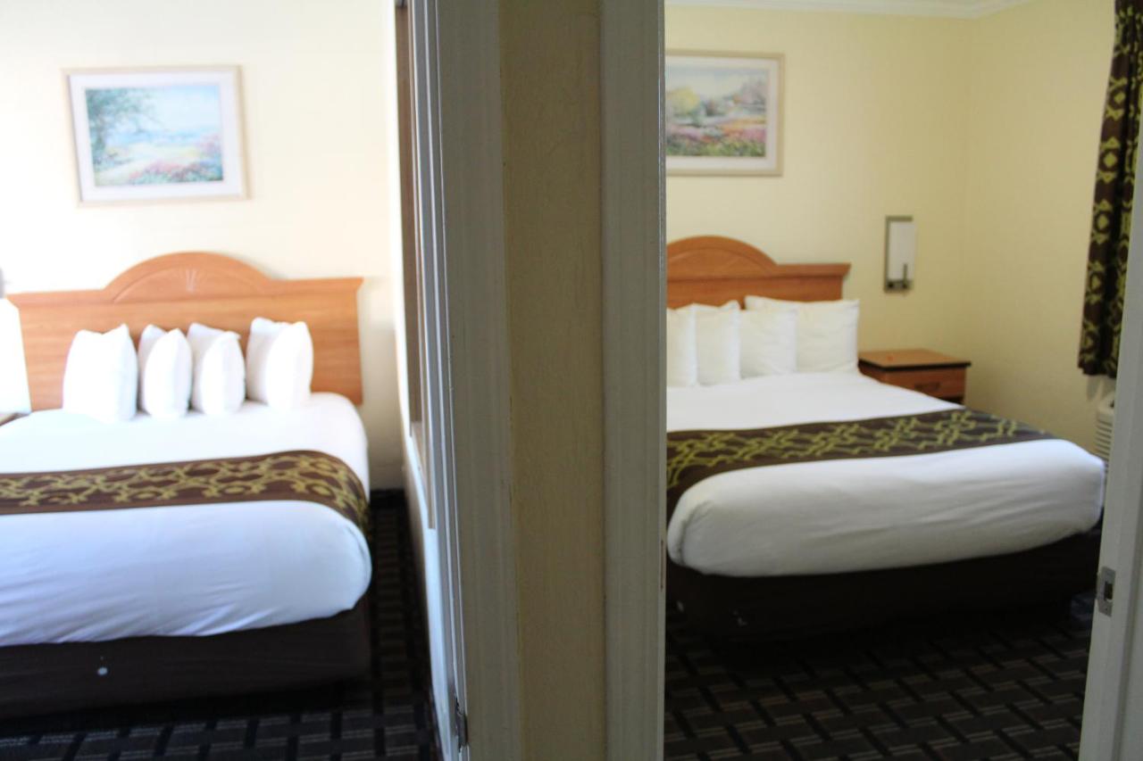 Family Suite 3 Queen Beds with Kitchenette - Non Smoking at Riverside Inn & Suites Santa Cruz
