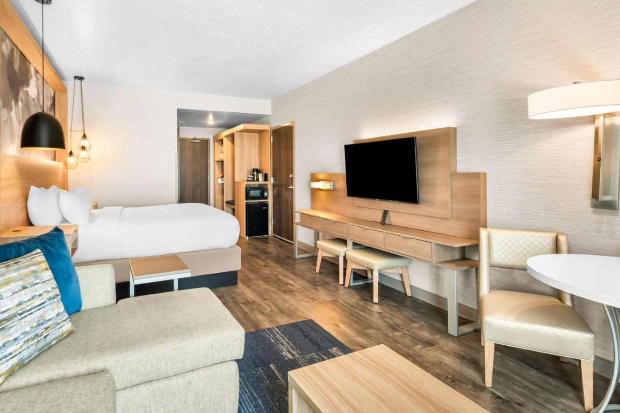 King Suite with Sofa Bed and Communication Assistance at Best Western Plus Settlers Point