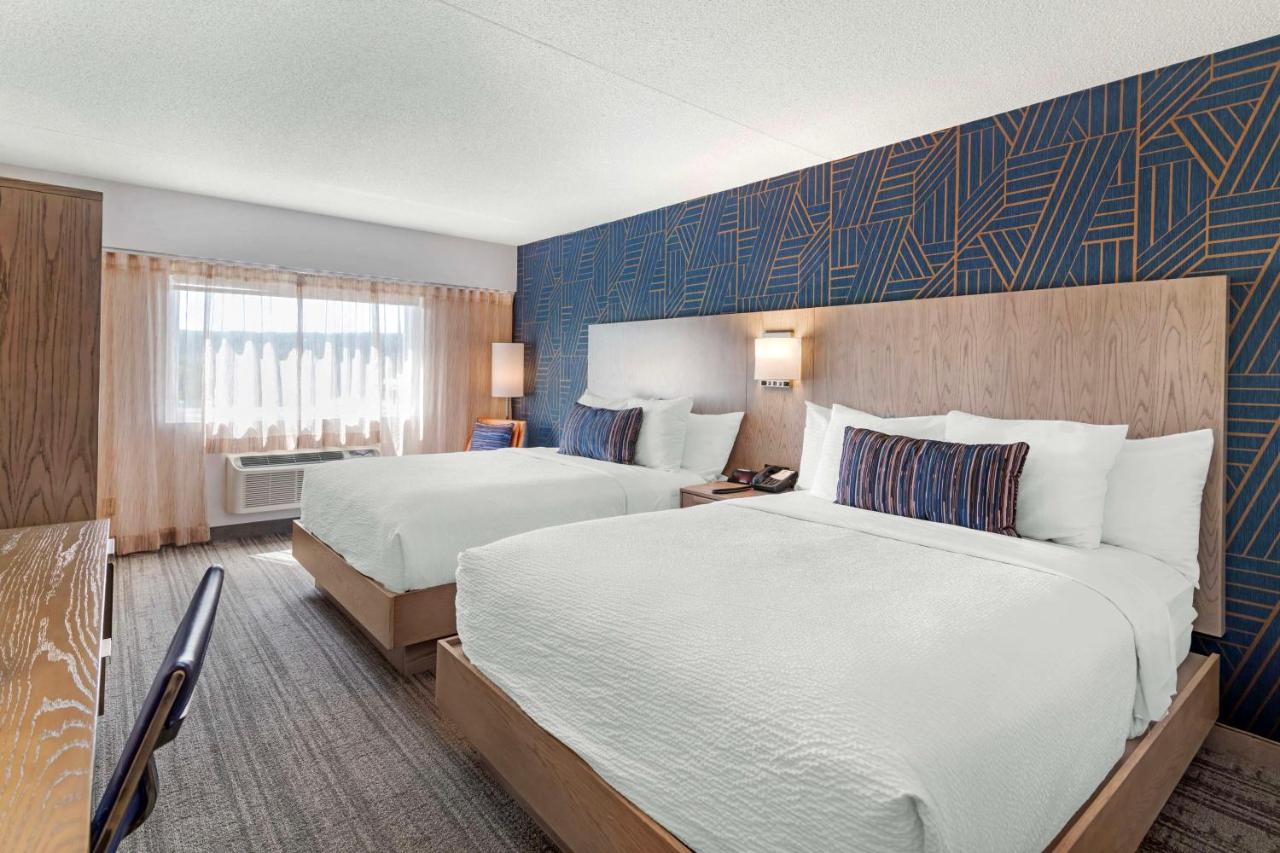 Queen Room with Two Queen Beds at Best Western Plus Landmark Inn
