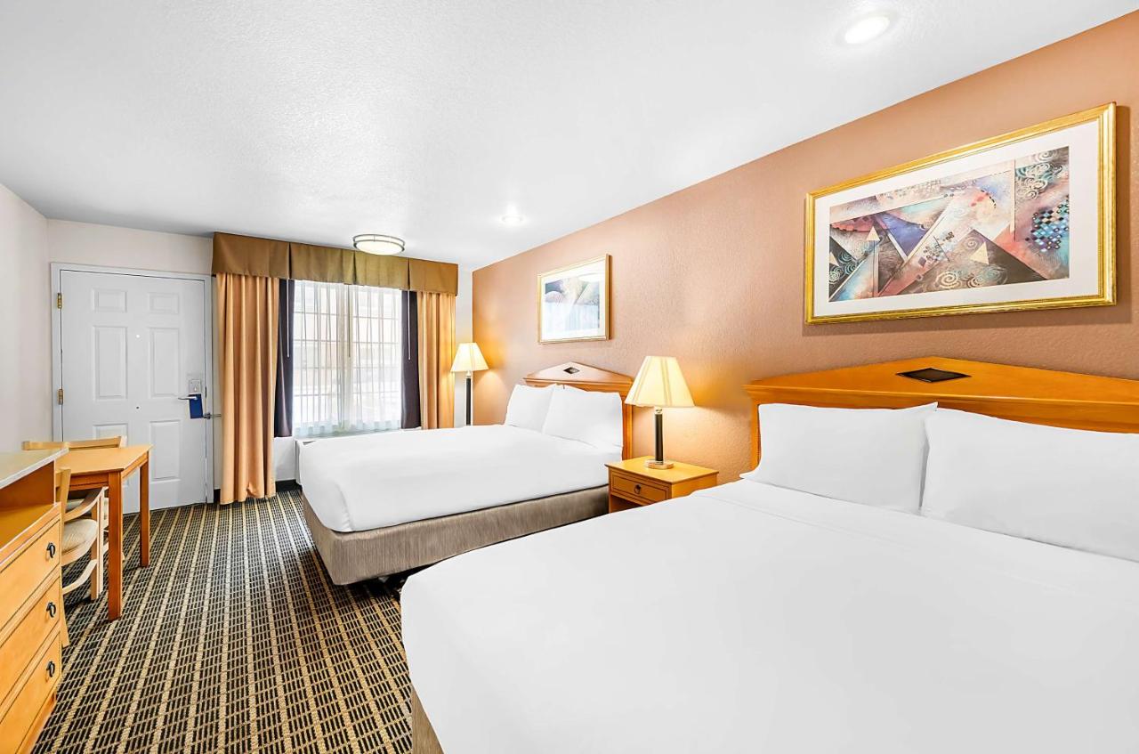 Double Room with Two Double Beds and Bath Tub - Disability Access at SureStayPlus Hotel by Best Western San Jose Central City
