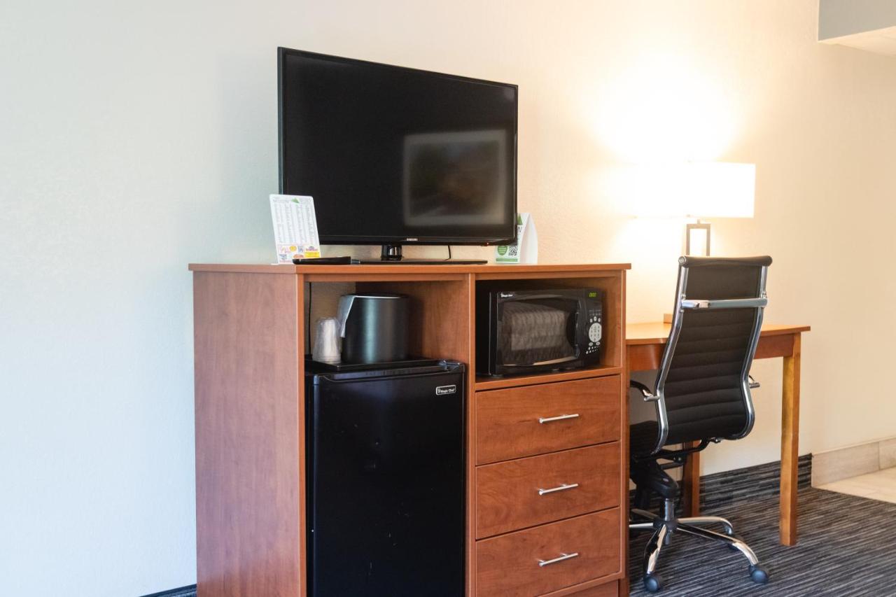 Queen Room with Two Queen Beds w/ fire place & private balcony at Twin Mountain Inn & Suites
