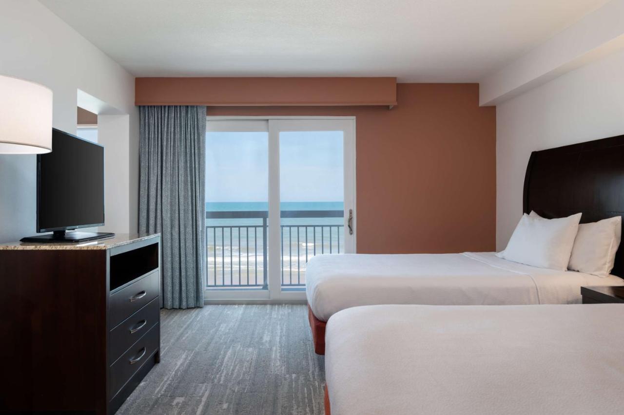 Deluxe Queen Room with Two Queen Beds and Balcony with Ocean-Front View at Hilton Garden Inn Daytona Beach Oceanfront