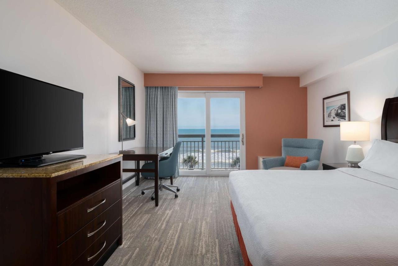 King Room Oceanfront with Balcony - Moblity/Hearing Accessible at Hilton Garden Inn Daytona Beach Oceanfront