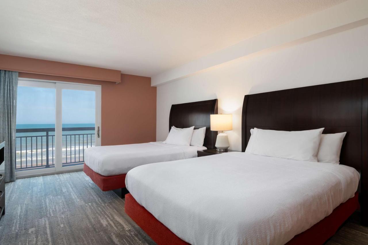 Deluxe Queen Room with Two Queen Beds and Balcony with Ocean-Front View at Hilton Garden Inn Daytona Beach Oceanfront