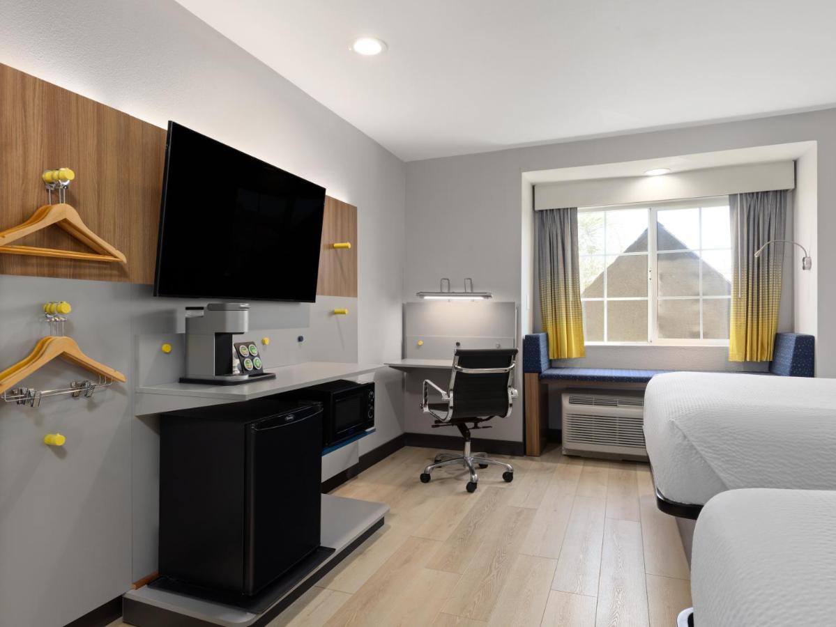 Queen Room with Two Queen Beds - Non-Smoking at Microtel Inn & Suites by Wyndham Tracy