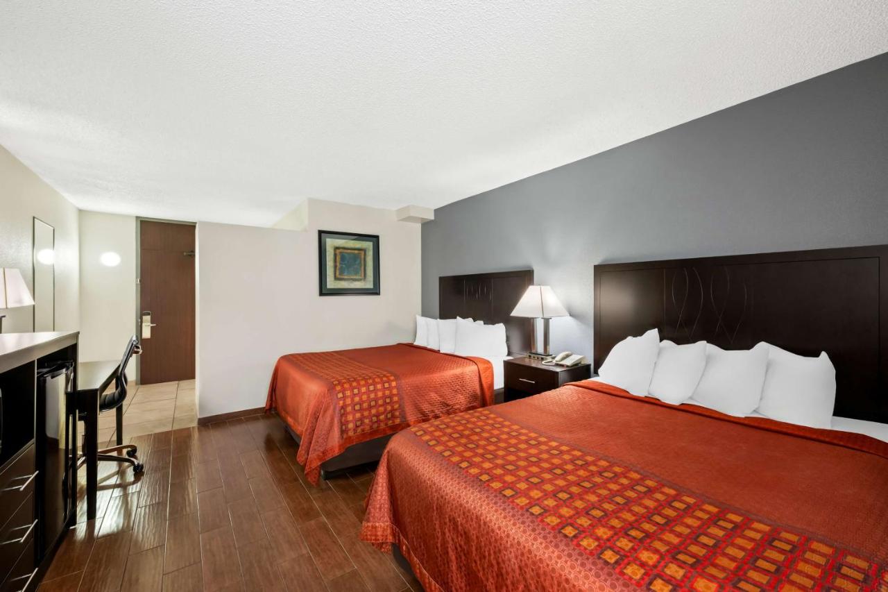 Queen Room with Two Queen Beds - Non-Smoking at SureStay Plus Hotel by Best Western Lubbock Medical Center