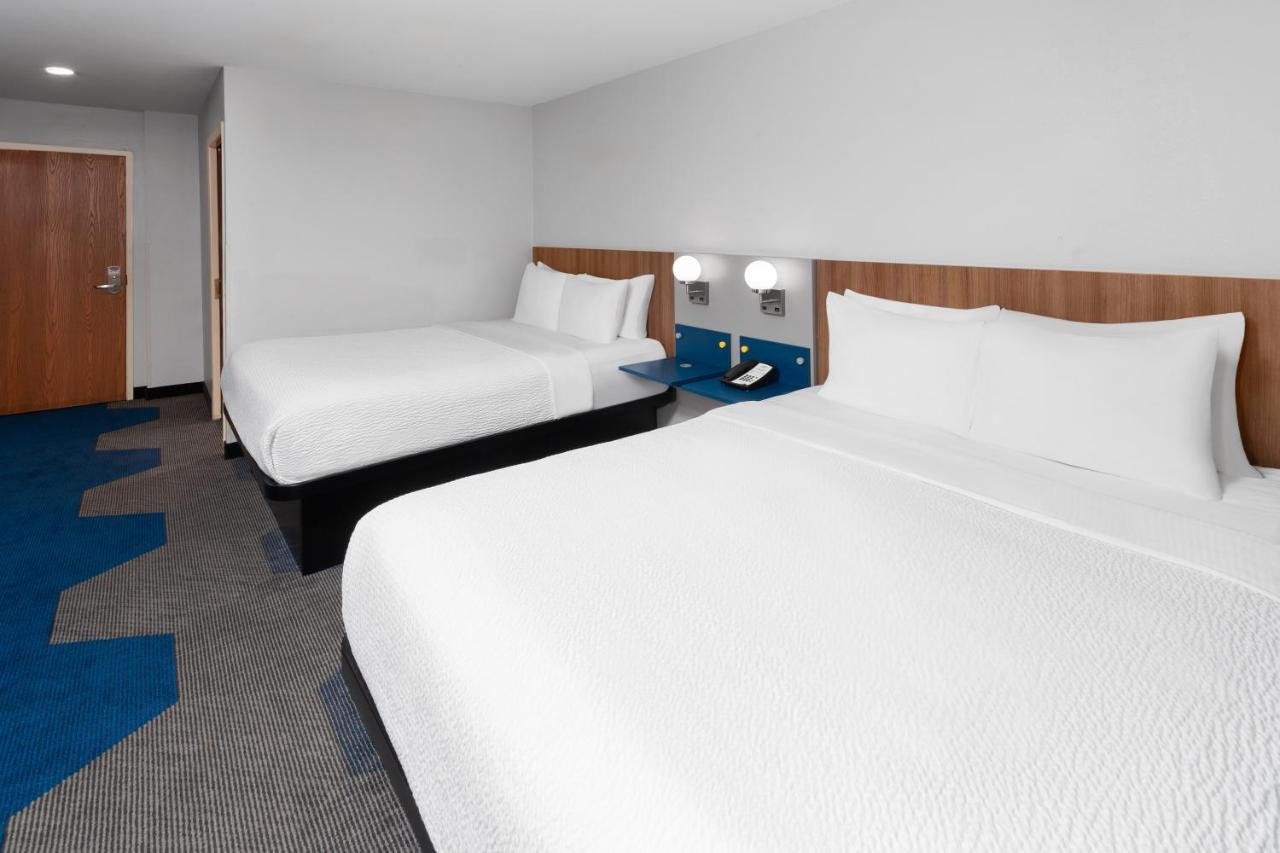 Deluxe Queen Room with Two Queen Beds - Disability Access - Non-Smoking at Microtel Inn by Wyndham Janesville