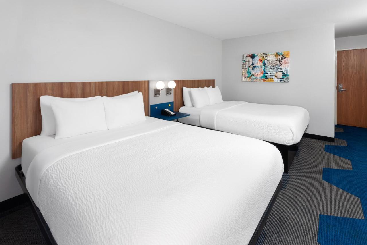Queen Room with Two Queen Beds - Non-Smoking at Microtel Inn by Wyndham Janesville