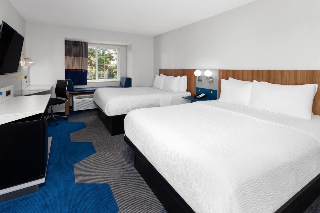 Queen Room with Two Queen Beds - Non-Smoking at Microtel Inn by Wyndham Janesville