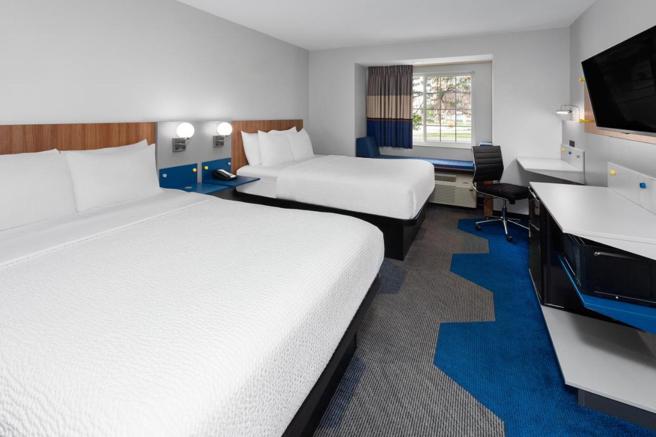 Deluxe Queen Room with Two Queen Beds - Disability Access - Non-Smoking at Microtel Inn by Wyndham Janesville