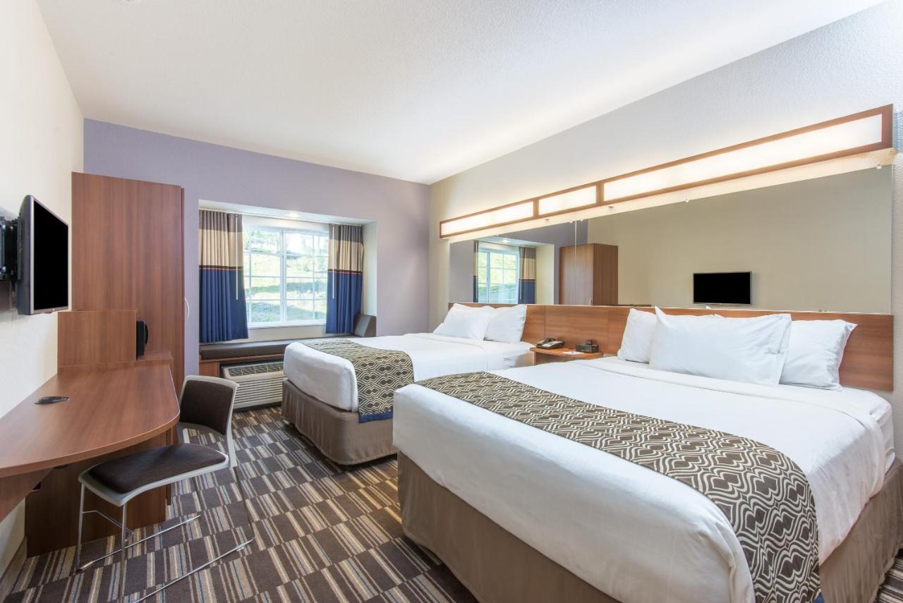 Deluxe Queen Room with Two Queen Beds - Disability Access/Non-Smoking at Microtel Inn & Suites By Wyndham Cadiz