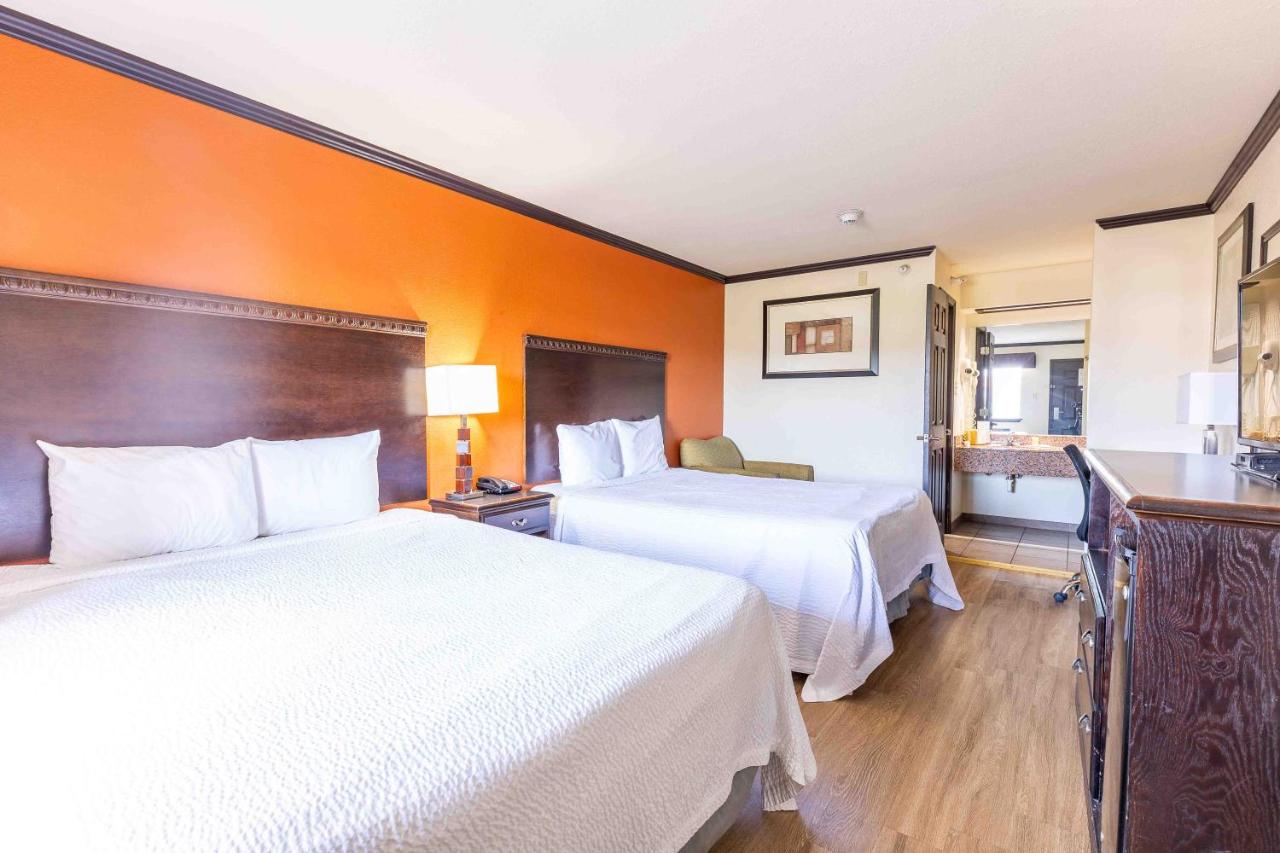 Queen Room with Two Queen Beds - Non-Smoking at Days Inn by Wyndham Oklahoma City/Moore