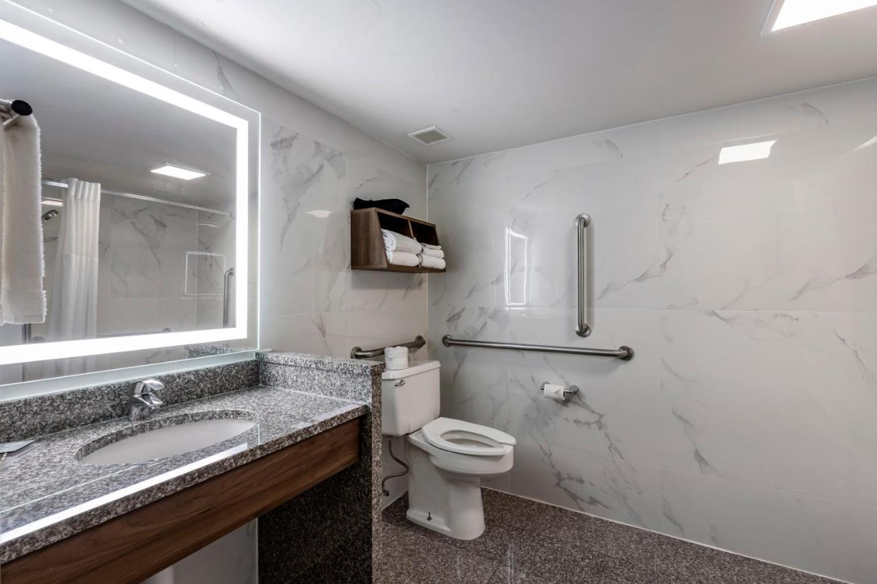 King Room with Mobility Accessible Tub and Sofa Bed at Best Western Plus St. Louis West-Westport