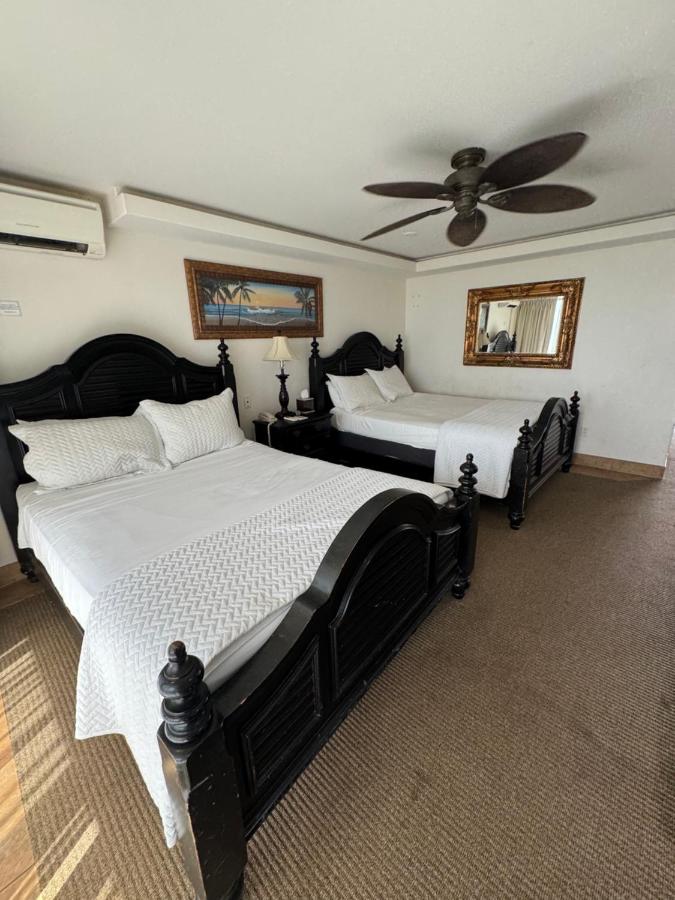 Queen Room with Two Queen Beds - Ocean Front at Hotel Coral Reef