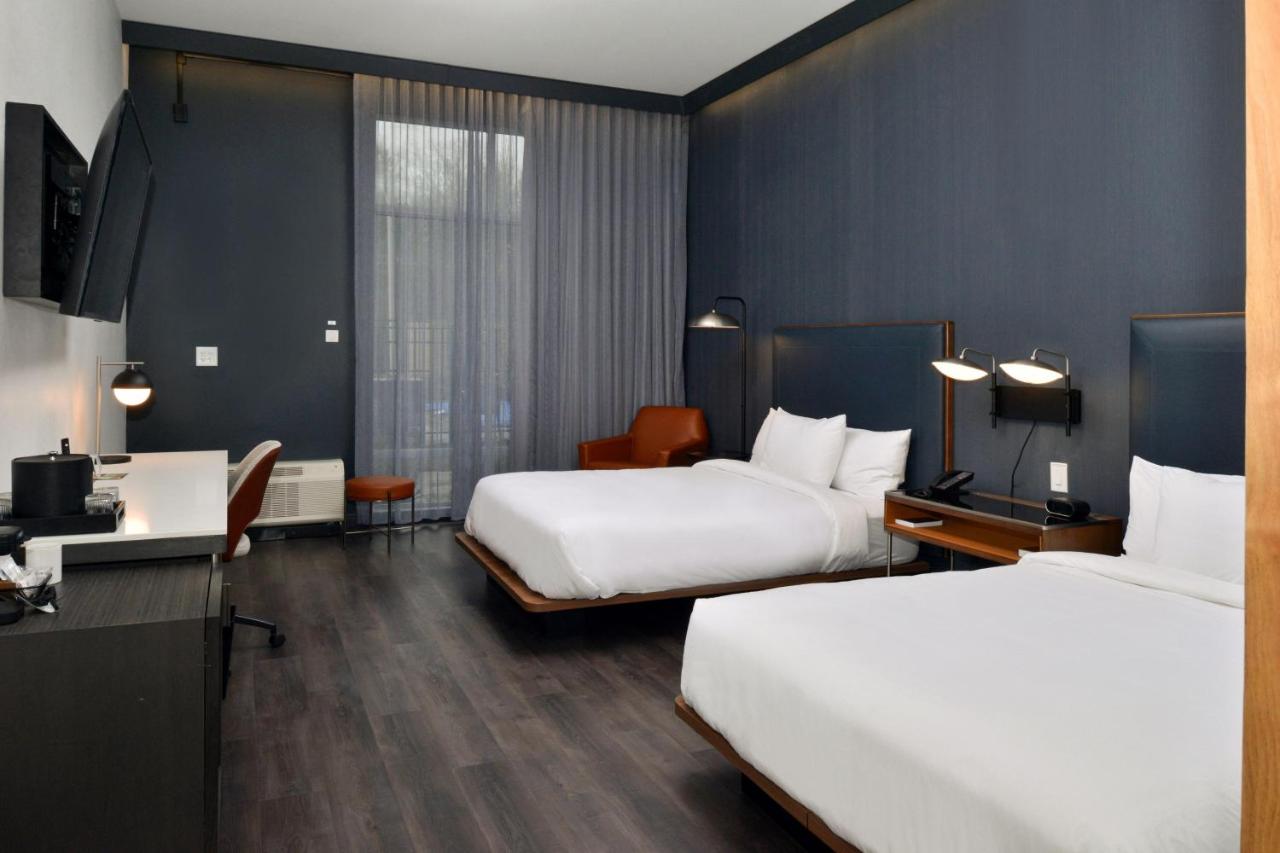 Double Queen Room at Courtyard by Marriott Raleigh Cary Crossroads