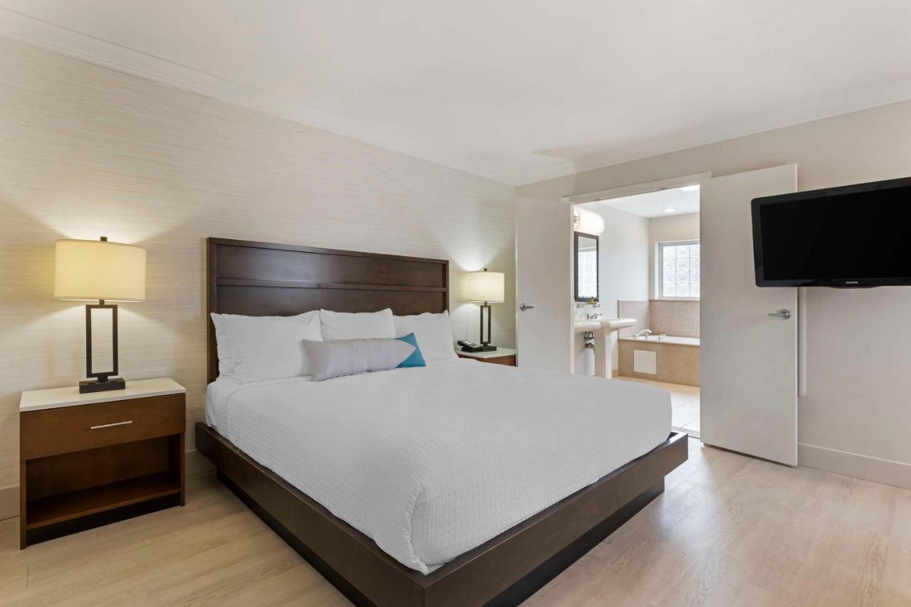 Accessible King Suite with Roll-in Shower at Best Western Plus All Suites Inn