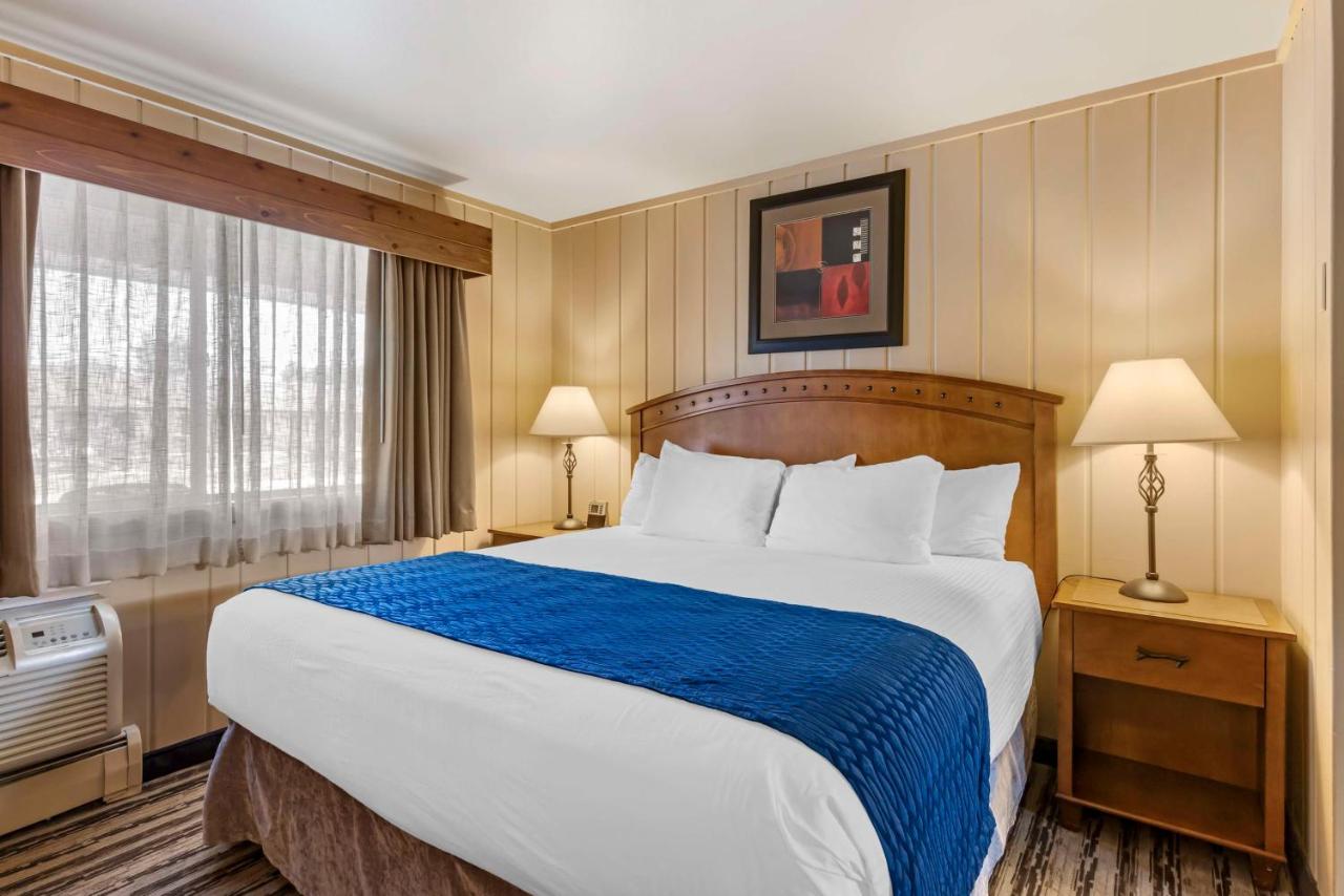 Room with King and Queen Bed at Best Western Sunset Inn