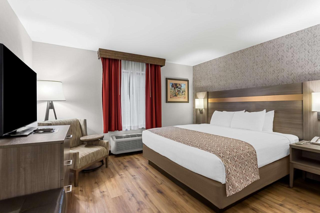 King Suite with Roll-In Shower and Balcony - Disability Access at Best Western Moriarty Heritage Inn