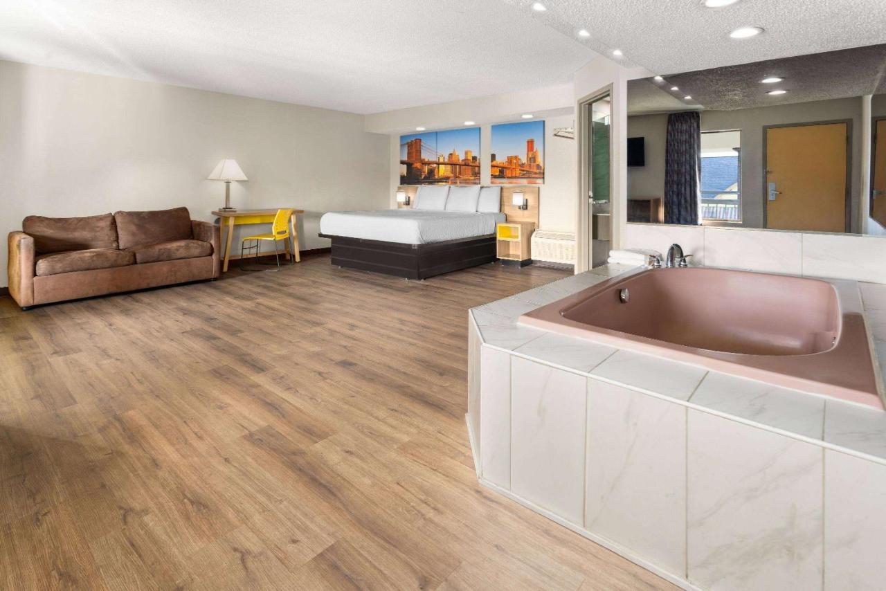 Superior King Suite with Sofa Bed - Smoking at Days Inn & Suites by Wyndham Albany