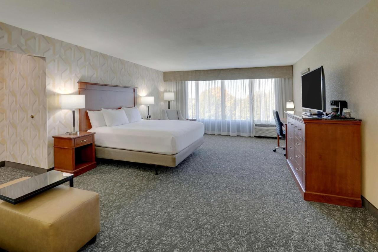 Deluxe King Room with Sofa Bed at Drury Inn & Suites Charlotte University Place