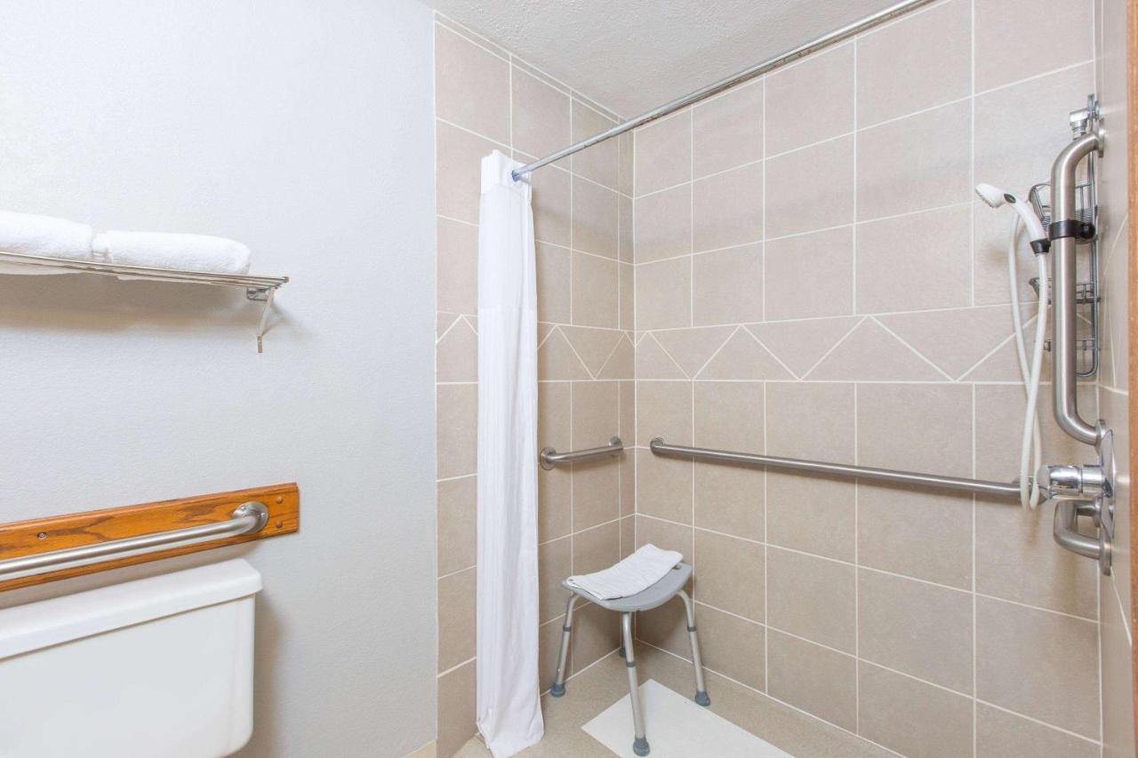 King Room with Roll-In Shower - Mobility/Hearing Accessible - Non-Smoking at Days Inn by Wyndham Hays
