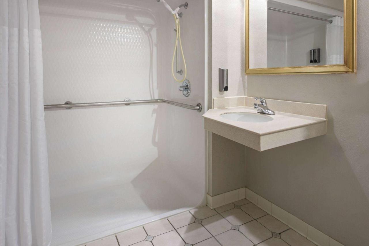 1 King Bed, Mobility Accessible Suite, Roll-In Shower, Non-Smoking at Days Inn & Suites by Wyndham Albany