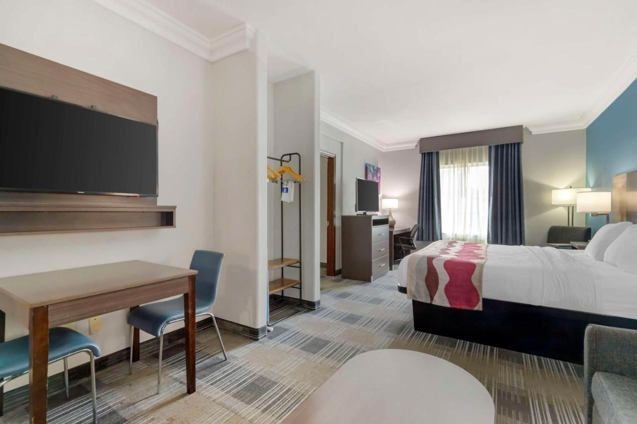 One-Bedroom Suite with One King and One Queen Bed at Best Western Medical Center North Inn & Suites Near Six Flags