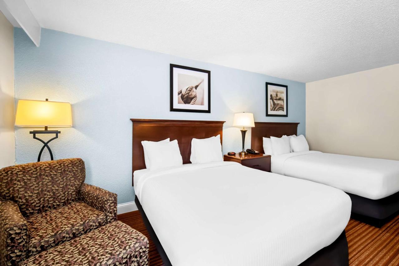 Queen Room with Two Queen Beds with Fireplace at Best Western Merry Manor Inn
