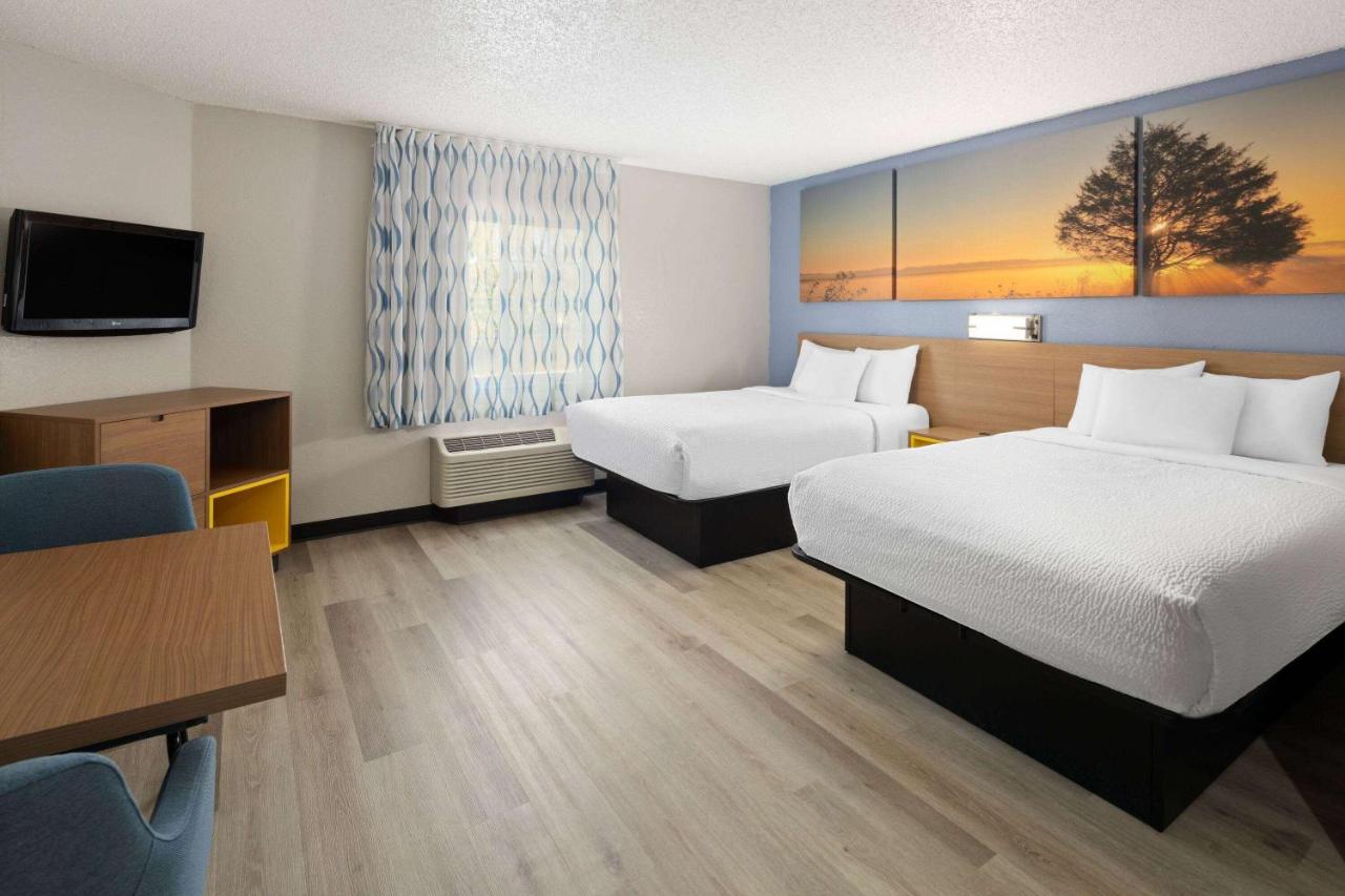 Deluxe Double Studio with Two Double Beds - Non-Smoking at Days Inn & Suites by Wyndham Green Bay WI.
