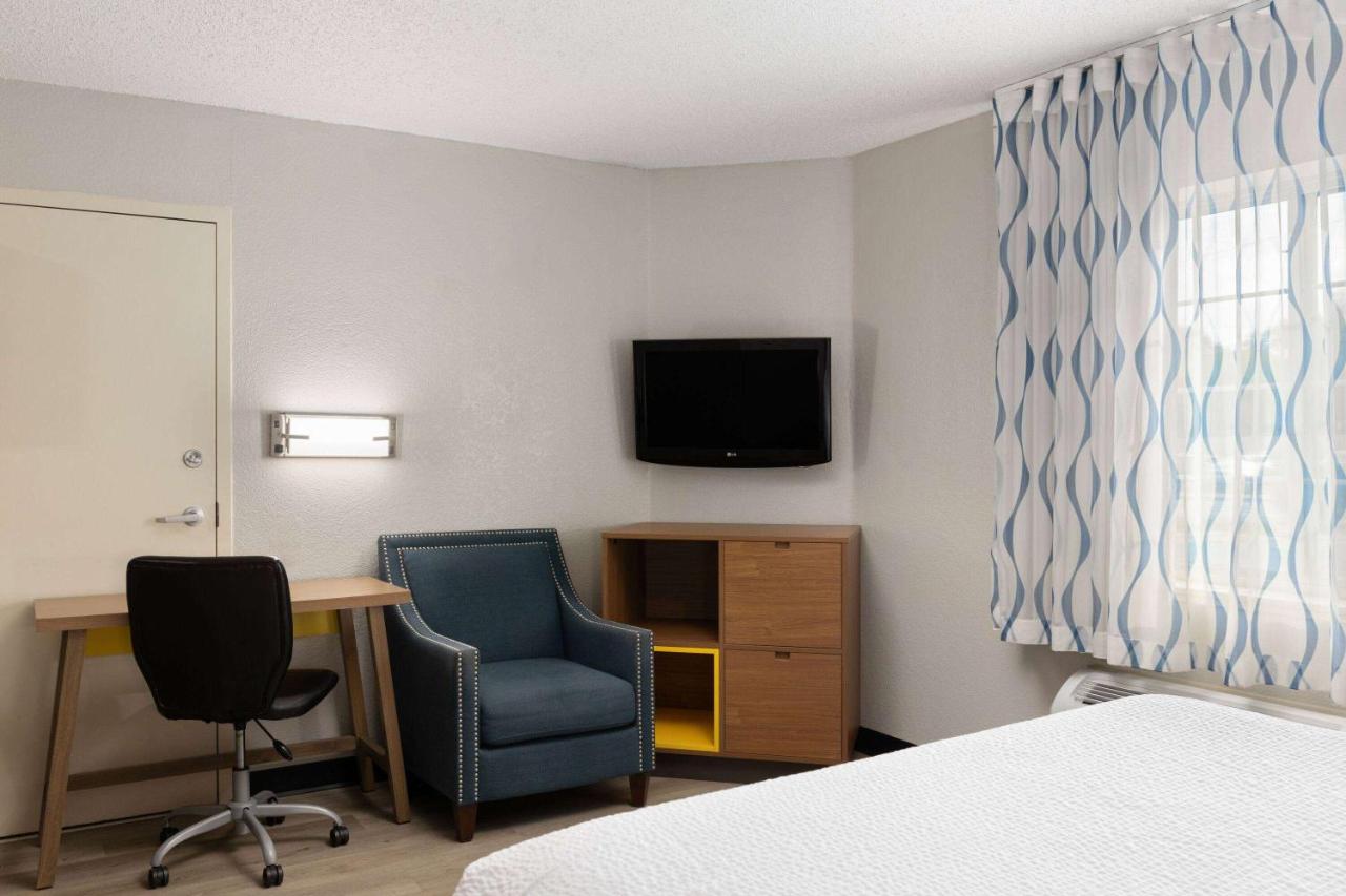 Queen Room - Disability Access - Non-Smoking at Days Inn & Suites by Wyndham Green Bay WI.