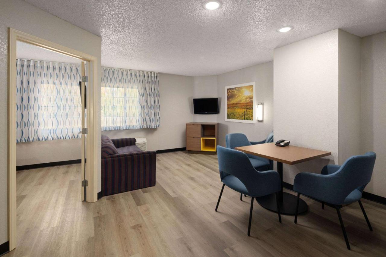 Queen Suite - Non-Smoking at Days Inn & Suites by Wyndham Green Bay WI.