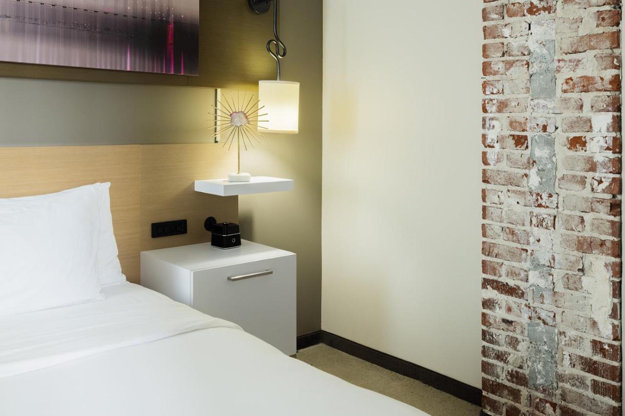 King Suite with Sofa Bed and Roll-in Shower - Accessible/Non-Smoking at voco Hotel Napoleon Memphis by IHG
