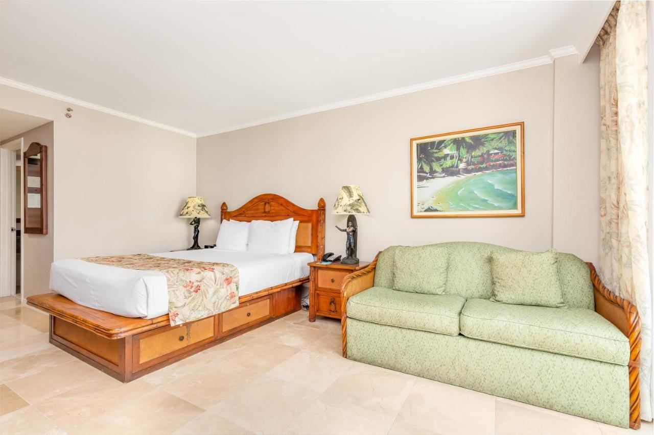 Queen Room with Partial Ocean View at Luana Waikiki Hotel & Suites