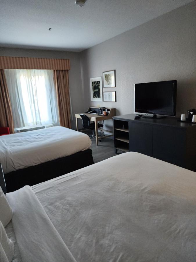 Queen Room with Two Queen Beds  Roll-In Shower - Disability Access/Non-Smoking at Country Inn & Suites by Radisson, Topeka West, KS